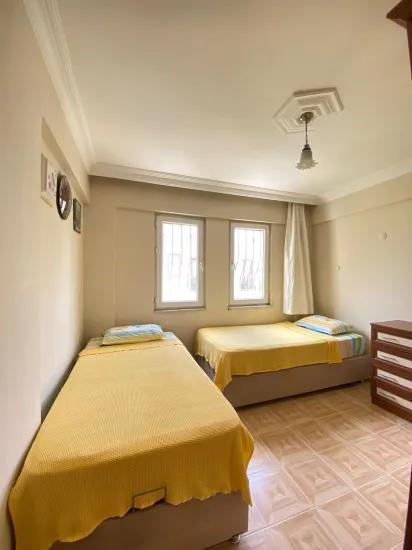 Fethiye In Foça with pool 2+1 apartment for sale, title deed, spacious airy apartment