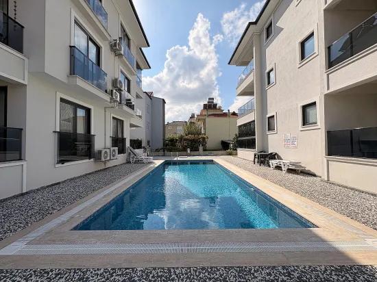 In Ortaca Beşköprü, Pool 2+1 Rental Apartment, Centrally Located