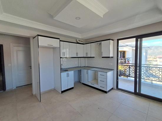 1+1 Brand New Apartment For Sale With Swimming Pool In Ortaca Karaburun