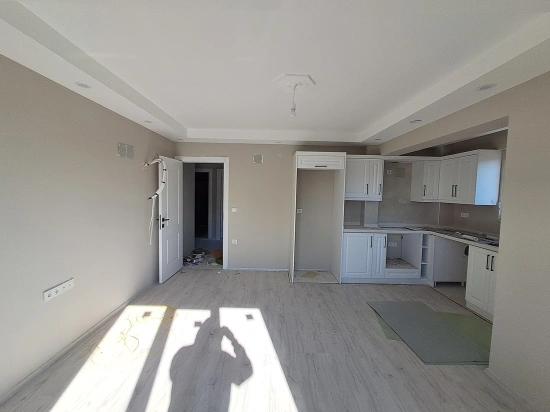 Günaydın Real Estate Offers A 2+1 Apartment With A Pool For Sale In Atatürk Neighborhood.