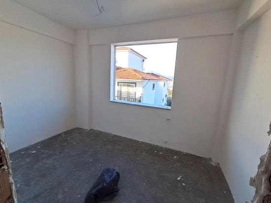 Spacious 2+1 Apartment For Sale In Ortaca Karaburun Neighborhood