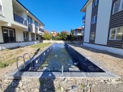 Günaydın Real Estate Offers A 2+1 Apartment With A Pool For Sale In Atatürk Neighborhood.