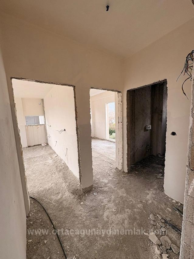 Продается Квартира 1+1 С Большим Бассейном В Районе Карабурун, Ортаджа, Мугла.