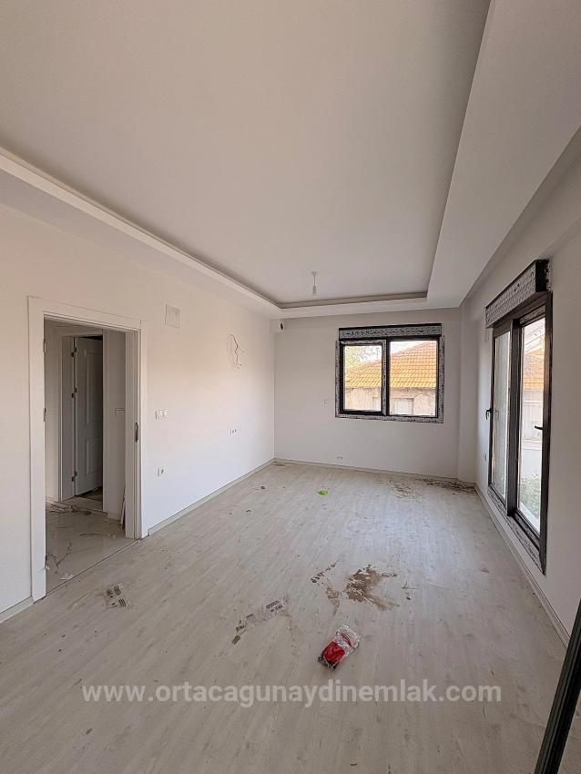 Продается 2+1 Квартира С Закрытой Кухней В Районе Карабурун, Ортача.