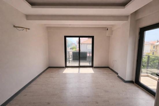 Сдается В Аренду Двухкомнатная Квартира (2+1) На Среднем Этаже В Районе Карабурун, Ортача.
