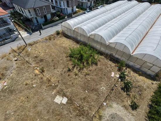 в Ortaca Gölbaşı 383 m2 виллой построенной участок на продажу