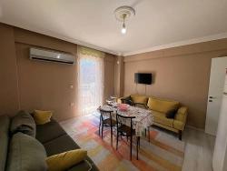 Сдается В Аренду Полностью Меблированная Квартира (1+1) В Районе Джумхуриет, Ортаджа, Мугла.