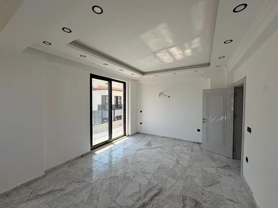 В Ortaca Bahçelievler 2+1 Закрытая Кухня С Бассейном Квартира На Продажу