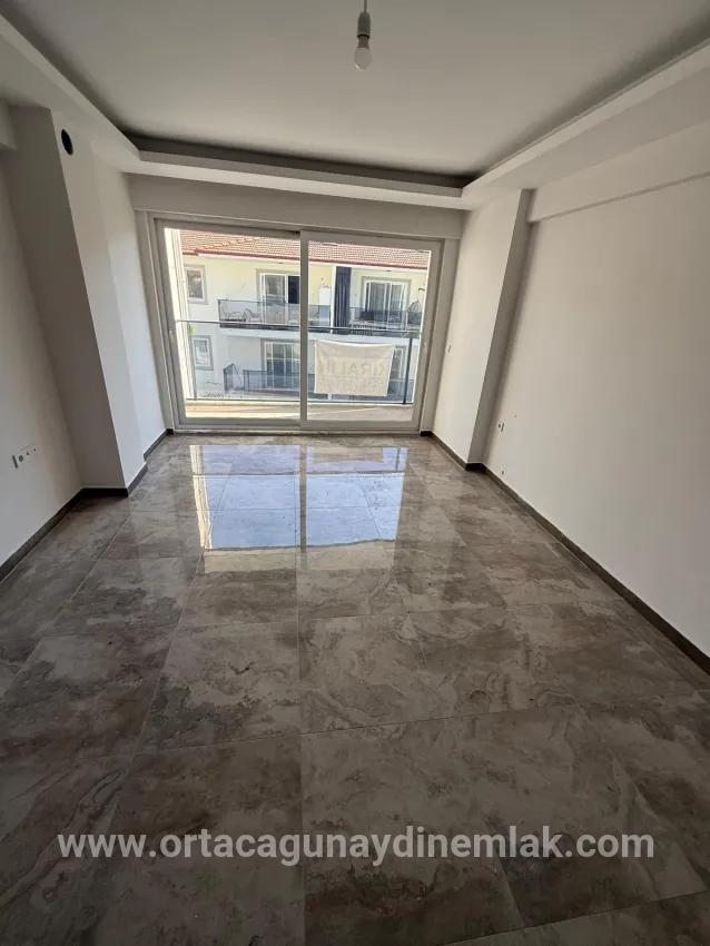 Ortaca Karaburun'da Havuzlu Sitede Kiralık 2+1 Daire