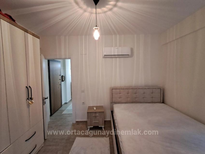 Günaydın Emlaktan Karaburunda Havuzlu Site Eşyalı 2+1 Kiralık Daire