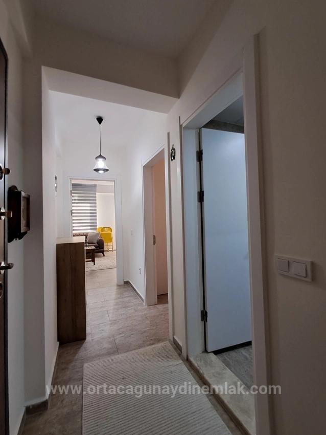 Günaydın Emlaktan Karaburunda Havuzlu Site Eşyalı 2+1 Kiralık Daire