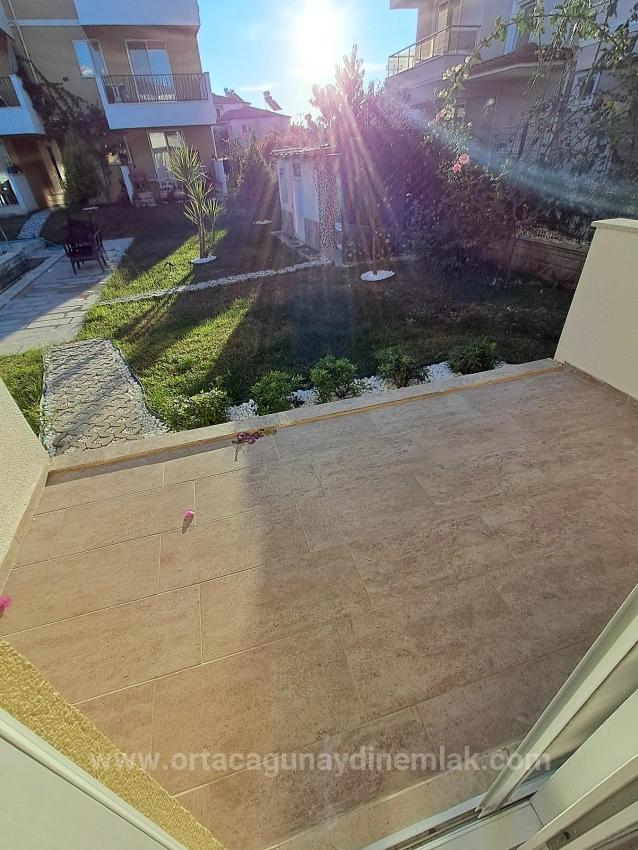 Günaydın Emlaktan Karaburunda Havuzlu Site Eşyalı 2+1 Kiralık Daire
