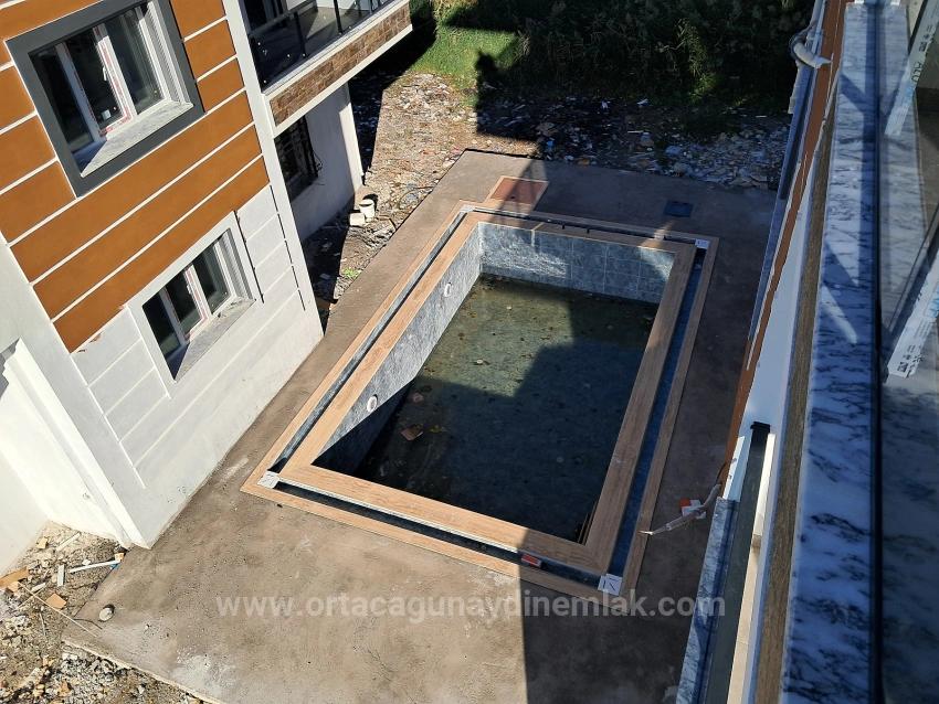 Günaydın Emlaktan Çaylıda Havuzlu 1+1 Satılık Sıfır Daireler