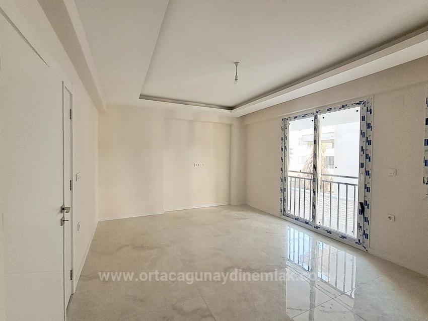 Ortaca Bahçelievlerde Ebeveyn Banyolu Havuzlu 2+1 Lüks Satılık Daire