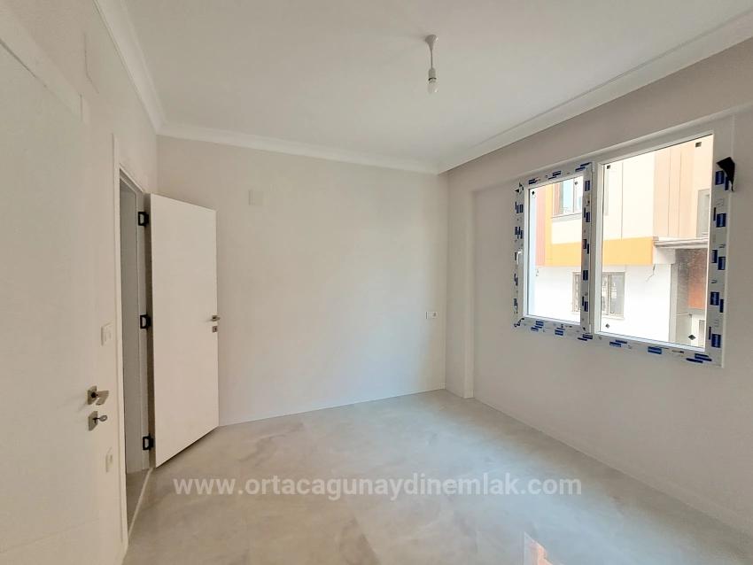 Ortaca Bahçelievlerde Ebeveyn Banyolu Havuzlu 2+1 Lüks Satılık Daire