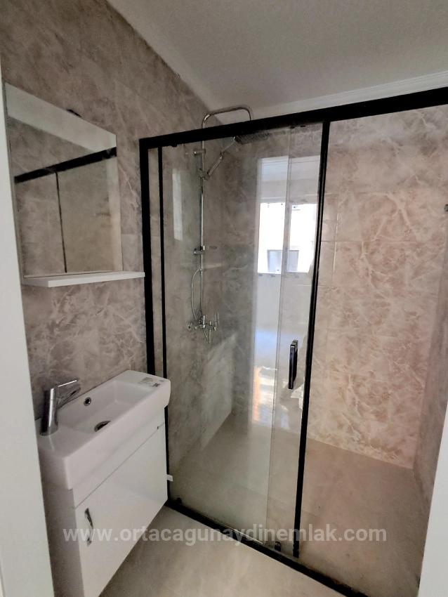 Ortaca Bahçelievlerde Ebeveyn Banyolu Havuzlu 2+1 Lüks Satılık Daire