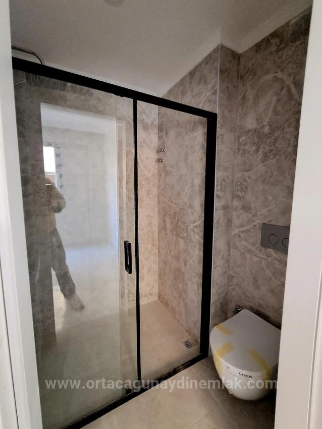 Ortaca Bahçelievlerde Ebeveyn Banyolu Havuzlu 2+1 Lüks Satılık Daire