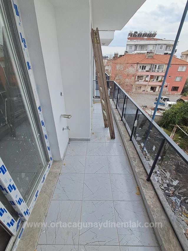 Muğla Dalaman Karaçalı Mahallesinde Sıfır Geniş 1+1 Satılık Daire