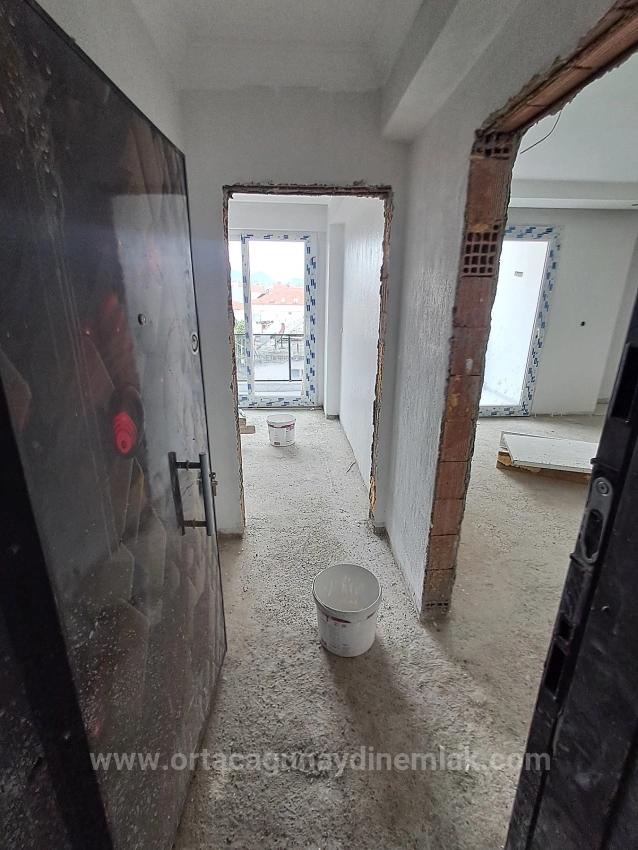 Muğla Dalaman Karaçalı Mahallesinde Sıfır Geniş 1+1 Satılık Daire