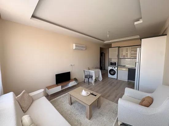 Dalaman Altıntas’da Eşyalı 1+1 Kiralık Daire, Servis Düzergahı