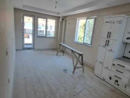 Günaydın Emlak'tan Ortaca Yerbelende Havuzlu 1+1 Satılık Daire