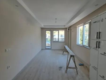 Günaydın Emlak'tan Ortaca Yerbelende Havuzlu 1+1 Satılık Daire