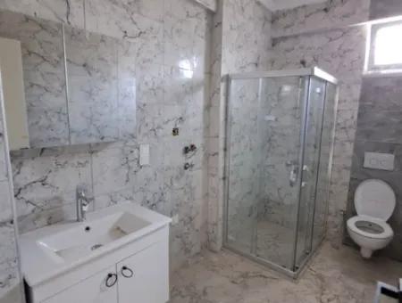 Günaydın Emlak'tan Ortaca Yerbelende Havuzlu 1+1 Satılık Daire