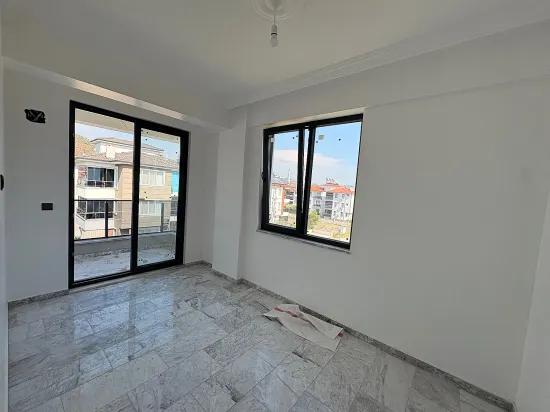 Ortaca Bahçelievler'de 2+1 Kapalı Mutfak Havuzlu Satılık Daire